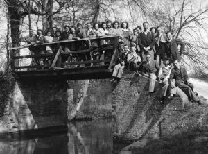 A group of Ramblers on a bridge over a canal